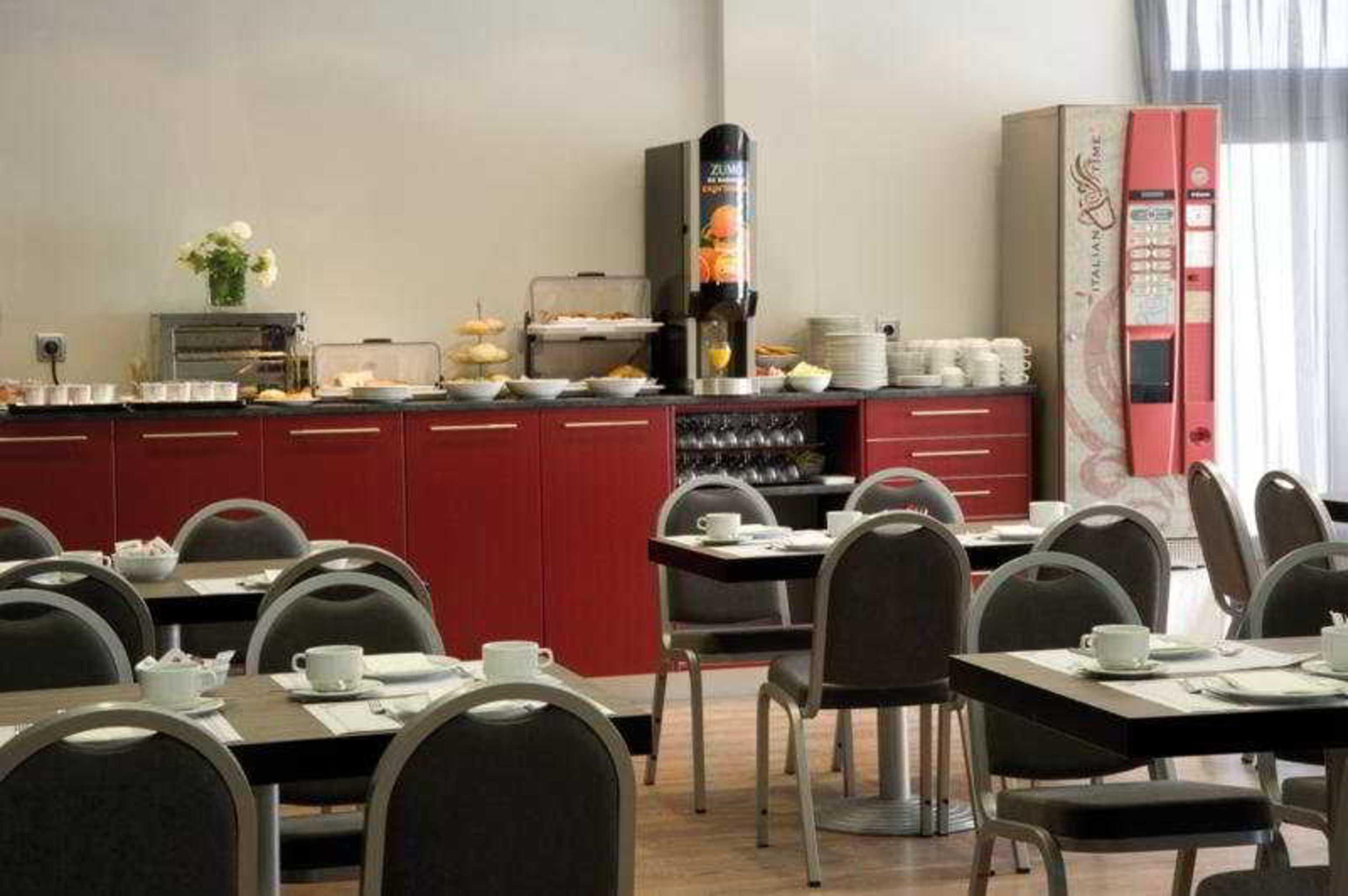 אלקאלה דה הנארס Hotel Cisneros מסעדה תמונה